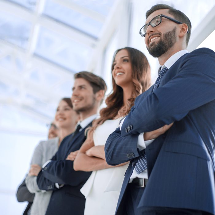 bottom view. successful businessman on the background of business team.photo with copy space